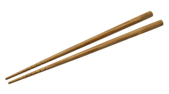 Elegant bamboo chopsticks ready for a delicious Asian meal, adding an authentic touch to your culinary creations and dining experiences