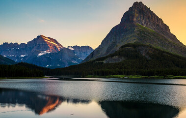 Sunset Reflections of the Mountains of Glacier above Swiftcurrent Lake, Many Glacier, Glacier National Park, Montana