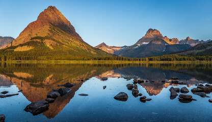 Crystal Clear Reflections of the Mountains on Swiftcurrent Lake, Many Glacier, Glacier National Park, Montana