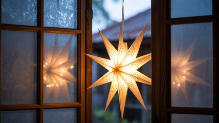weihnachten Illuminated christmas star light hanging in window holiday decoration festive mood