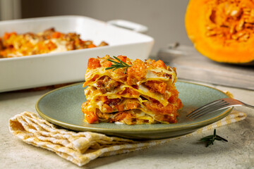 Pumpkin, cheese and sausage lasagna. Italian Baked pasta, homemade food.