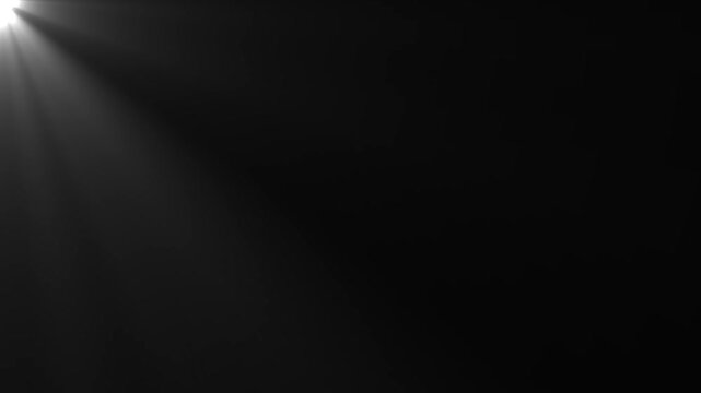 High-quality stock footage of sun rays light effects, overlays or flare glow array isolated on black background. overlay, light transition, Photo camera flashes on the stadium, seamless loop. 4k
