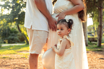 Young child with family in peaceful park setting