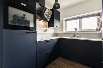 Modern Dark Themed Kitchen Interior