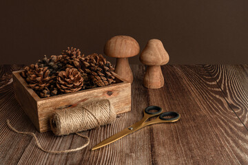 Rustic pinecone centerpiece with wooden decor elements