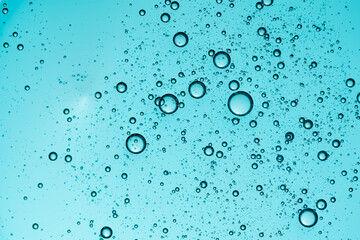 Blue gel bubbles in close-up abstract background