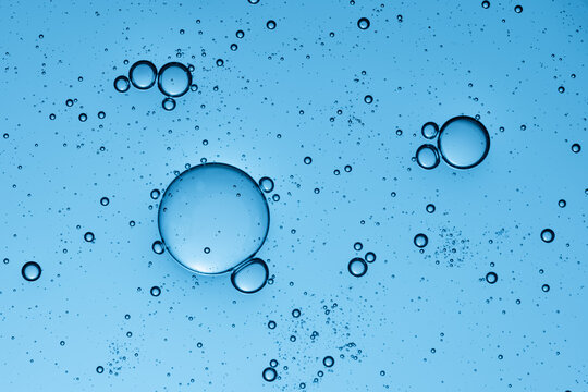Blue gel texture with air bubbles close-up