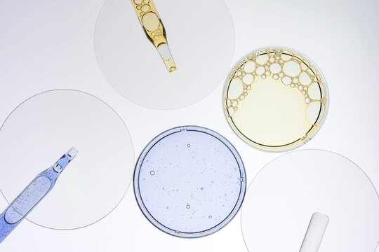 Top view of varied cosmetic gels in clear glassware