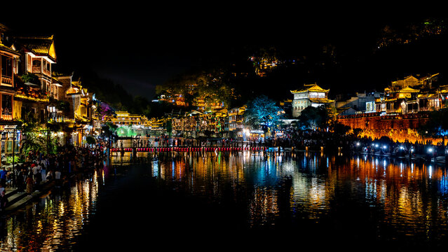 Stepping stone crossing at Tuojiang River at night