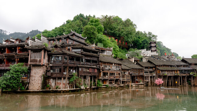 Traditional wooden stilted houses along the Tuojiang River