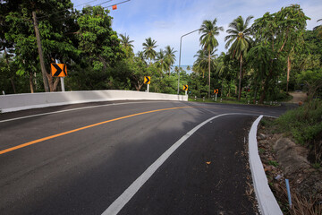 Road with a white line and a yellow line