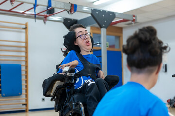 Boccia player with cerebral palsy in training with his coach