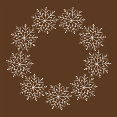 Intricate white snowflake wreath with dotted outlines, seamless circular pattern on dark brown background for holiday cards and winter decorations