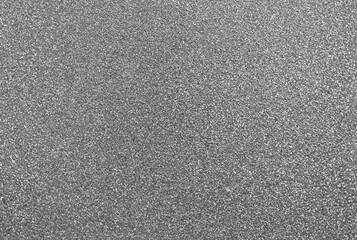 Fototapeta premium Silver glitter background, metallic shiny glitter particles creating a beautiful textured effect for website, marketing and social media, chrome metal-gray sparkling sequins glistering backdrop image