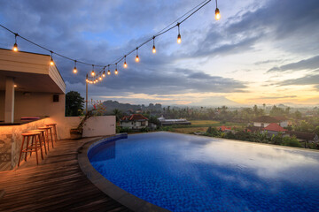 Obraz premium Pool with a view of the city and mountains