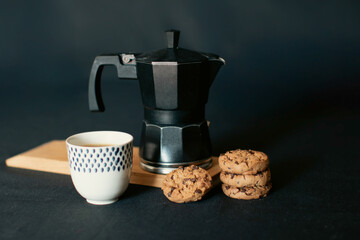 Rustic coffee setup with a stack of homemade cookies