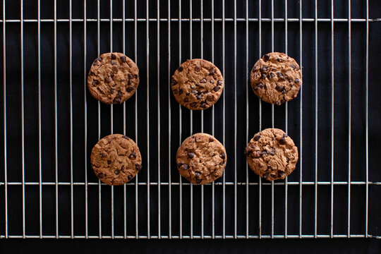 Chocolate chip cookies cooling on wire rack