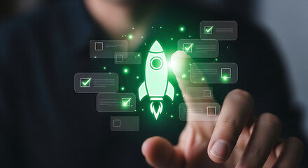 Obraz premium Businessman touching a glowing rocket ship hologram representing business startup growth