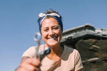 Woman with broken down car in Australia