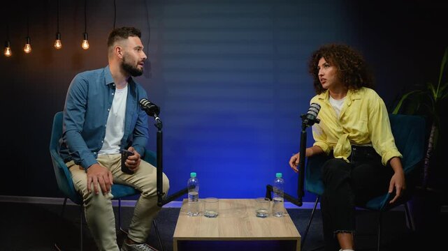 Two influencers recording a podcast interview