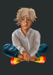 a boy sits cross-legged on the floor