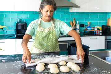 Woman preparing dough for air fryer baking in kitchen