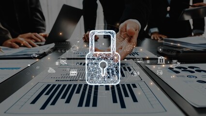 Business team collaborates in a modern office while discussing digital security, showcasing a...