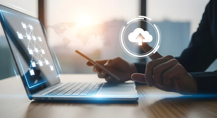 Person using laptop and smartphone with cloud computing technology overlay
