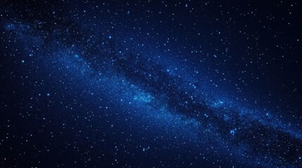 Naklejka premium Vast starry night sky with dense milky way galaxy displaying cosmic beauty