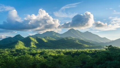 Fototapeta premium The image shows a picturesque landscape of rolling green mountains under a bright sky filled with fluffy white clouds.
