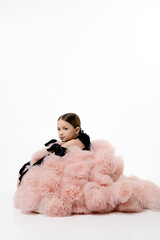 Young Girl in Fluffy Pink Dress