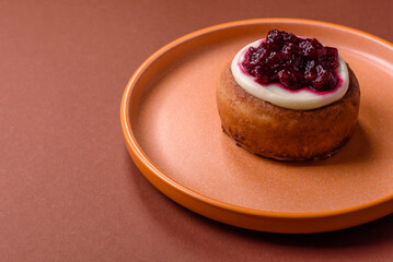 Cinnamon roll, a sweet bun with citrus, cherries, and chocolate, a Danish dessert with cream