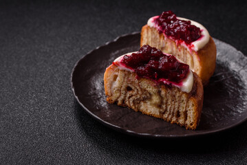 Cinnamon roll, a sweet bun with citrus, cherries, and chocolate, a Danish dessert with cream