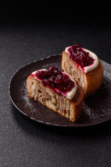 Cinnamon roll, a sweet bun with citrus, cherries, and chocolate, a Danish dessert with cream