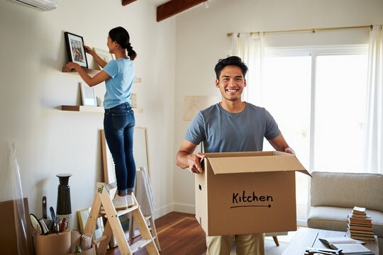 Young couple moving into their new home together