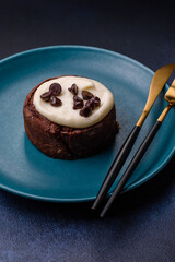 Cinnamon roll, a sweet bun with citrus, cherries, and chocolate, a Danish dessert with cream