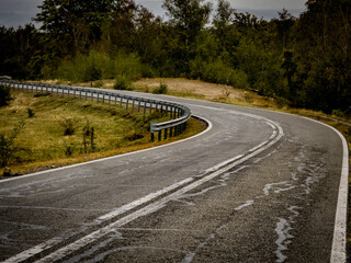 Curve on Transalpina road after rain