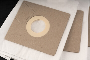 New paper vacuum cleaner bag. Clean disposable container or pouch
