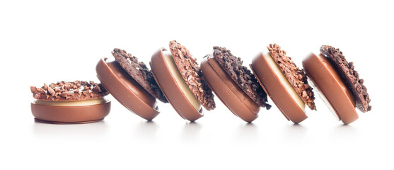 Sweet chocolate pralines. Chocolate candies isolated on white background.