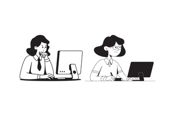 Two women working on computers in an office setting