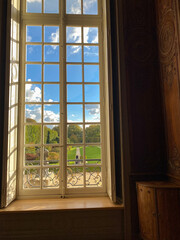 Scenic Garden View through Elegant Window