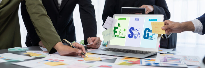 Analyst team use sticky note for creative and analytic brainstorm for business idea with BI data dashboard on laptop screen. Analysis financial data visualization tech for marketing strategy. Prodigy