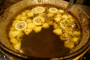 Hot mulled wine with lemon and with pineapple