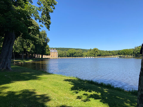 Lakeside View with Historic Chateau and Trees