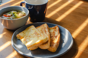 French toast breakfast with soup and coffee
