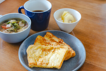 French toast breakfast with soup, coffee and fruit
