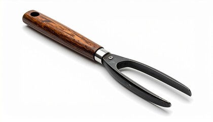 Close-up shot of a carving fork with a wooden handle, perfect for serving meat.