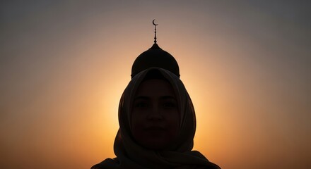 Muslim woman's silhouette stands serene at sunset evoking faith and hope, with a mosque