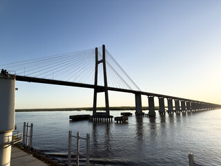 vessel passing under the bridge via the river 10 