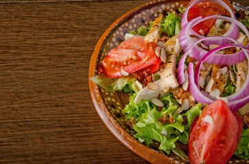 Fresh Healthy Grilled Chicken Salad with Tomato, Onion, and Almonds